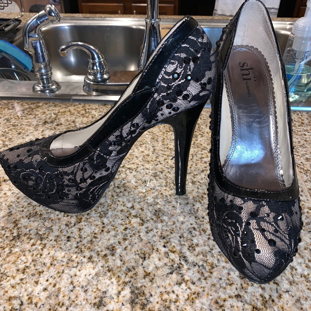 Lace and black diamond heels